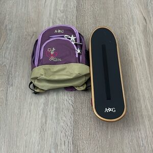 Vintage book bag, and skateboard